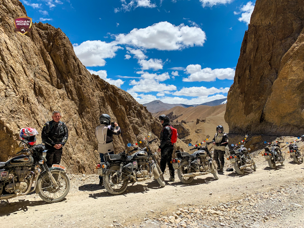 A panoramic view of the cold desert of India with bikers I Leh Ladakh to Manali bike trip package I Discover Ladakh bike tour