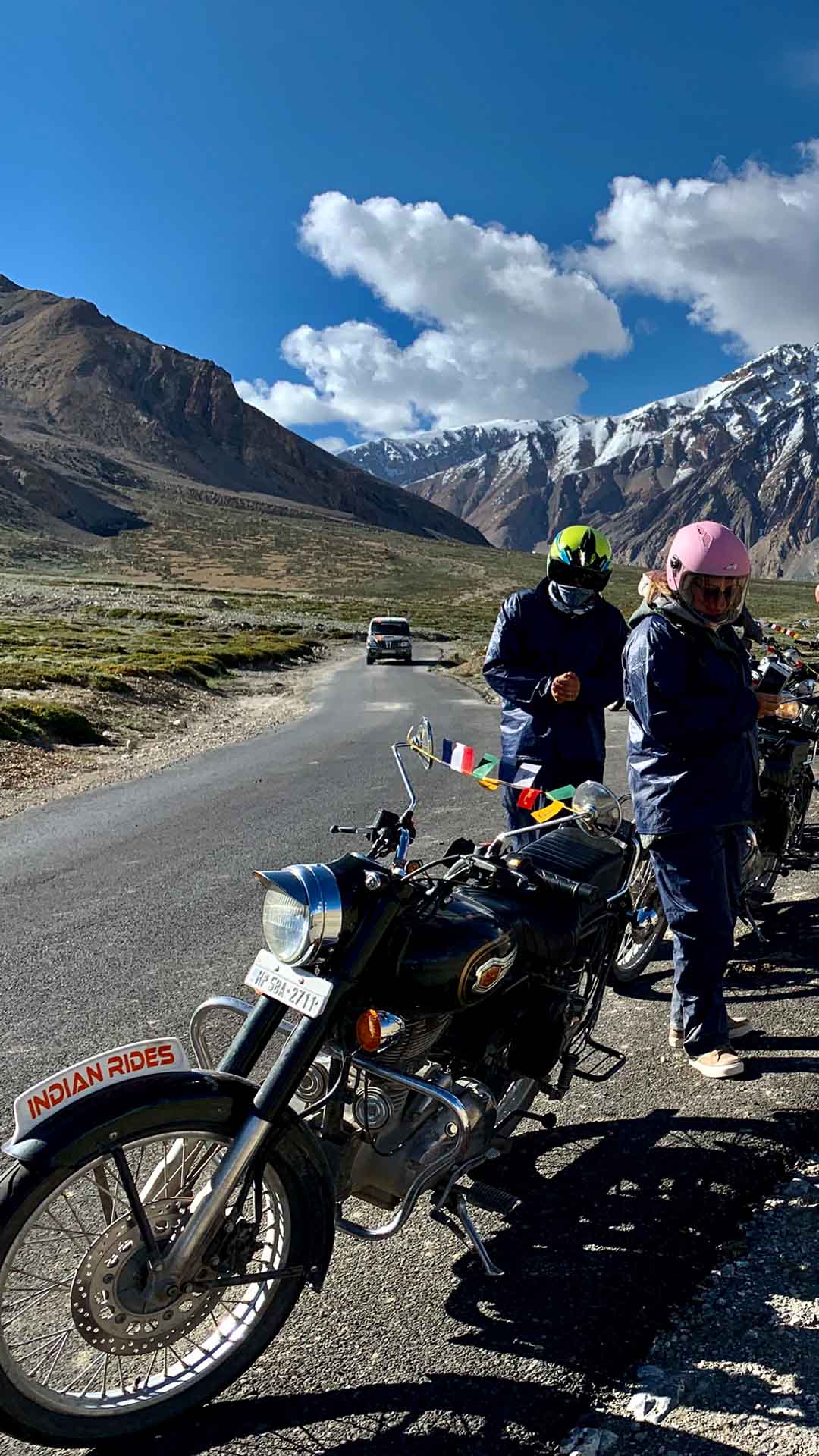 A view of snow capped mountains, desert & bikers I Bikers on a Journey to the Sacred Monasteries of Himalayas on Motorcycle